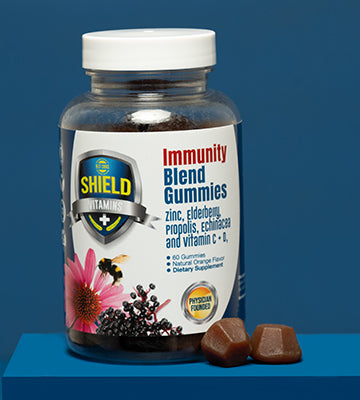Shield Vitamins Immunity Blend Gummies photographed on blue background