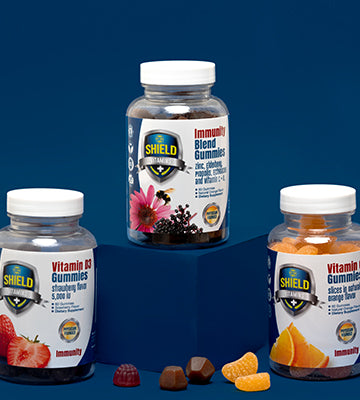 Shield Vitamins Immunity Kit photographed on blue background
