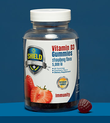 Shield Vitamins D3 Gummies photographed on blue background